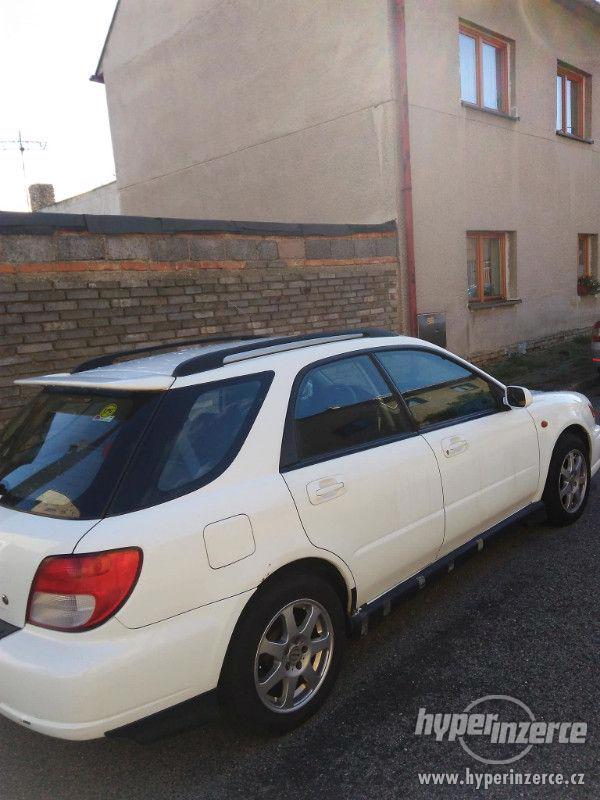 Subaru Impreza 2.0 - foto 2