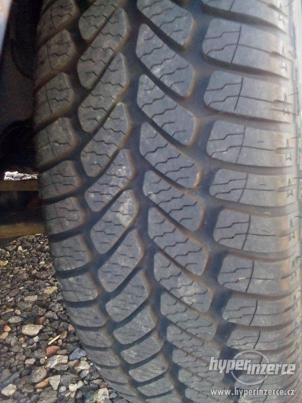 Celoroční pneu-Ford Fusion - foto 1