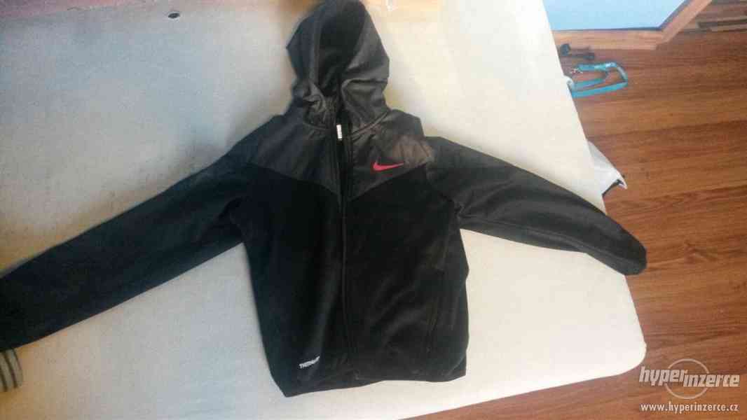 zánovní bunda Nike Softschel 130 - 145cm - foto 1