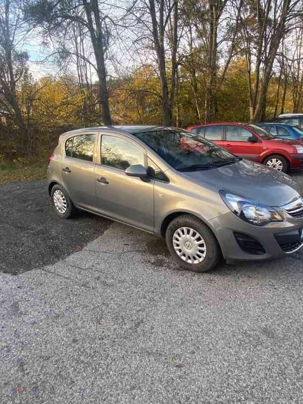 Opel Corsa 1,2   D - foto 6