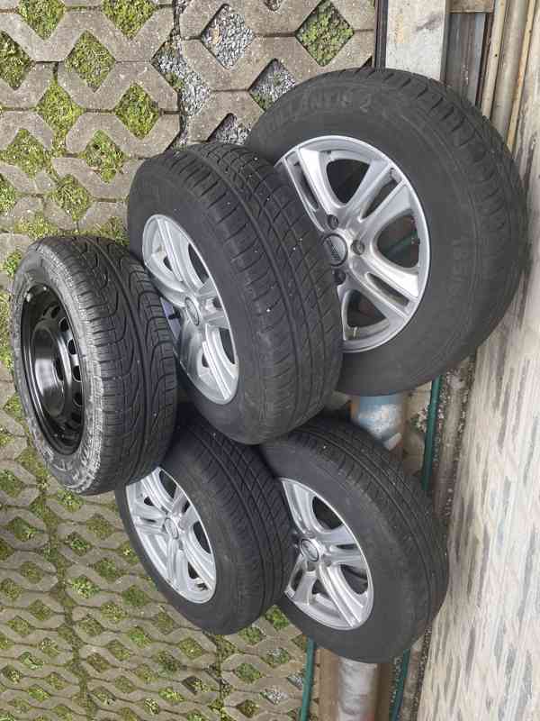 Prodám litá kola s pneumatikami 5x Hyundai Accent - foto 7