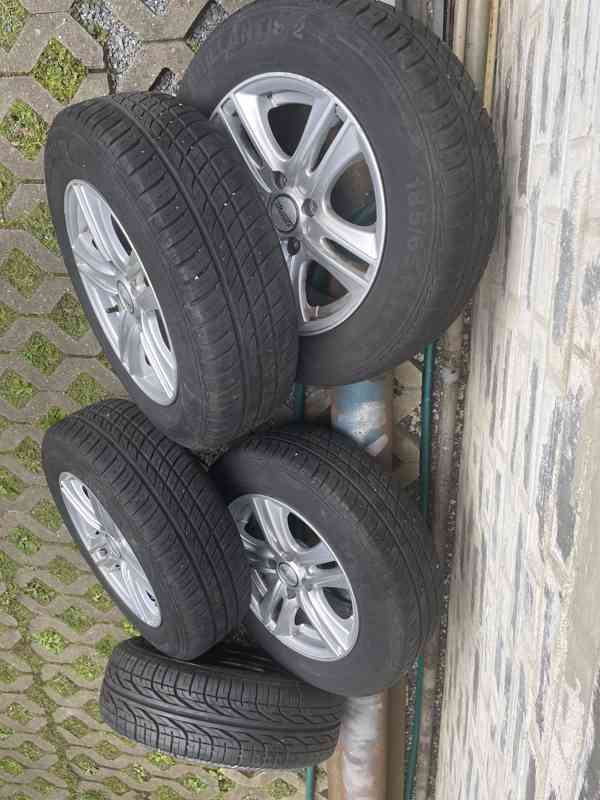 Prodám litá kola s pneumatikami 5x Hyundai Accent - foto 8