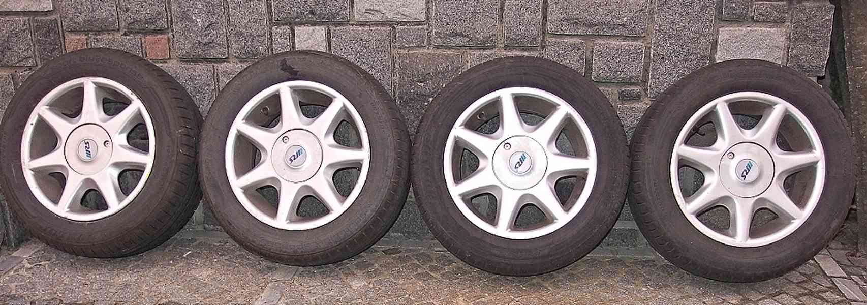 Letní pneu Dunlop + alu disky, Ford Focus - foto 1