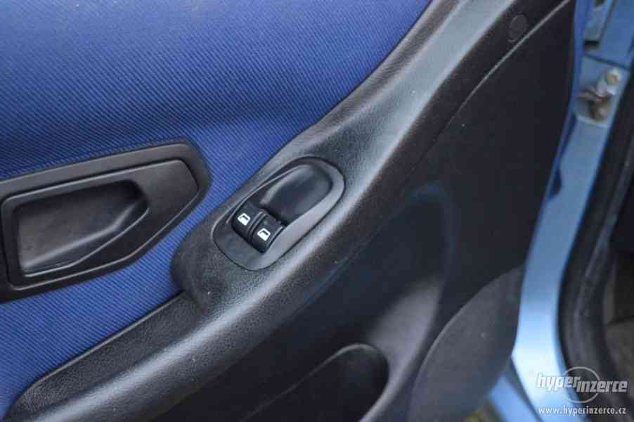 Peugeot 306 1.4i, nová STK, super stav, garážováno - foto 11