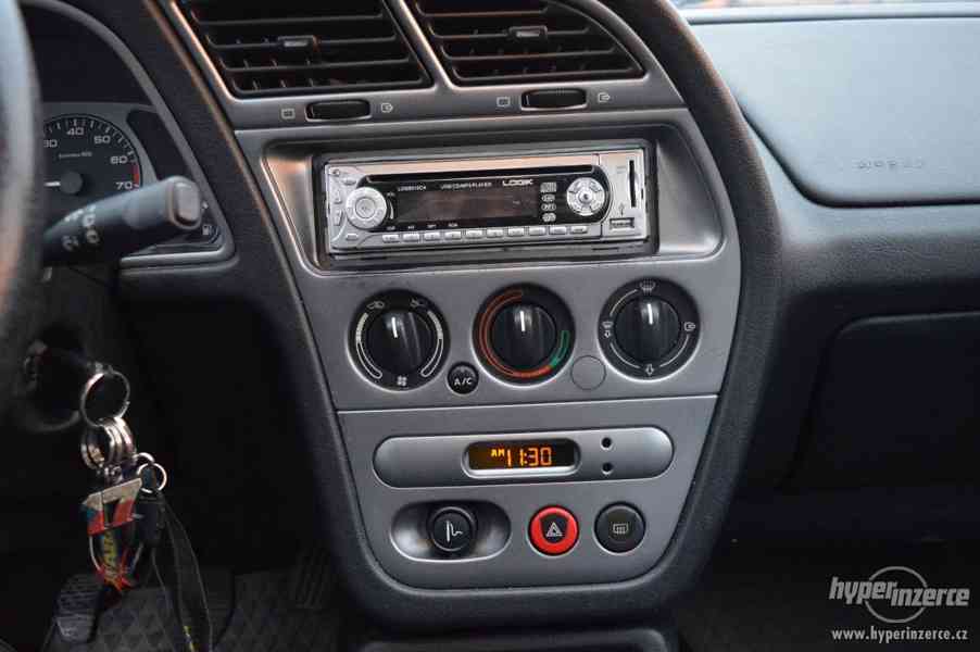 Peugeot 306 1.4i, nová STK, super stav, garážováno - foto 14
