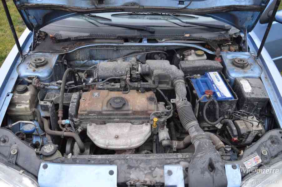 Peugeot 306 1.4i, nová STK, super stav, garážováno - foto 18