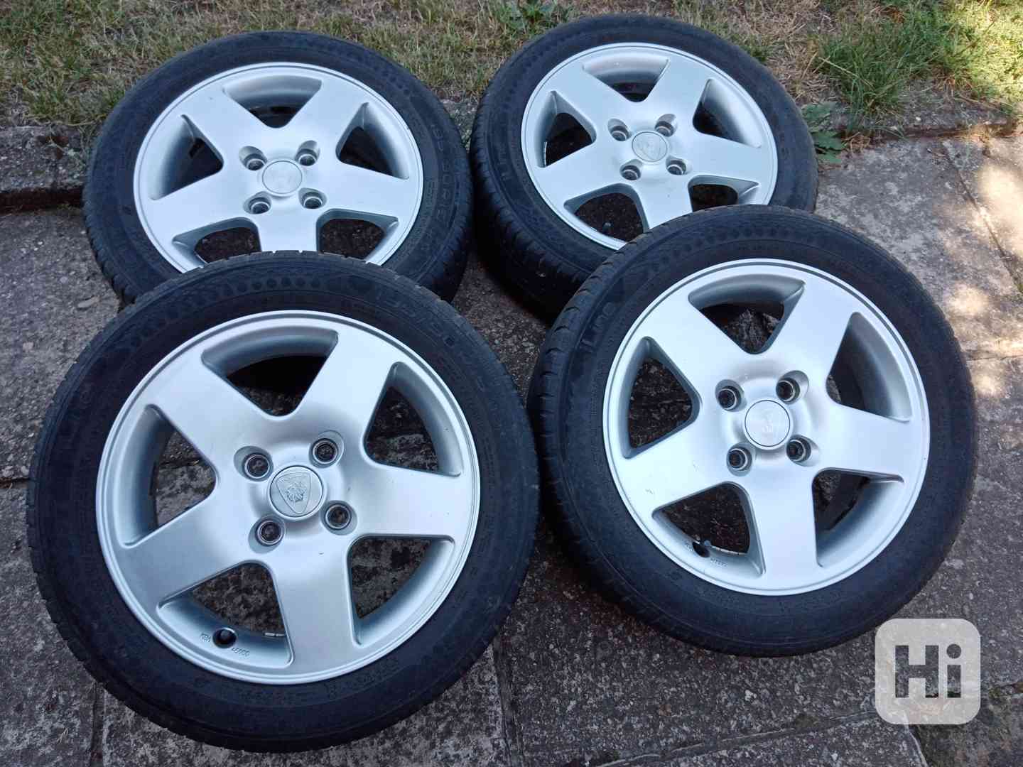 Obutá alu kola 15ky 4x108 FORD PEUGEOT CITROEN - foto 1