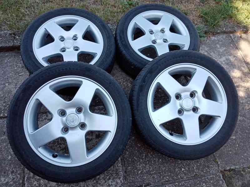 Obutá alu kola 15ky 4x108 FORD PEUGEOT CITROEN - foto 1