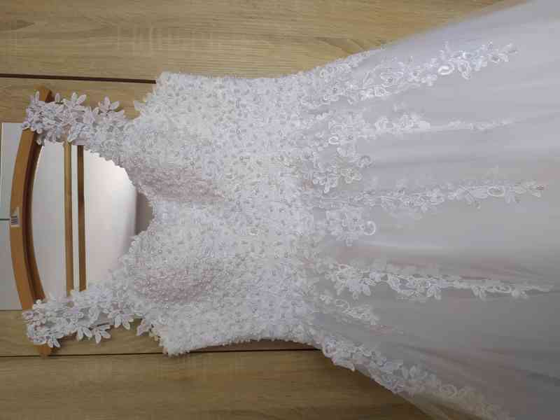 Svatební šaty  - foto 4