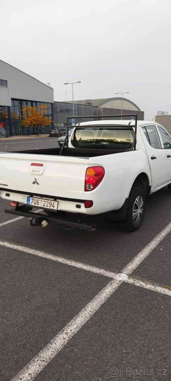 Mitsubishi L200 2,4   Mitsubishi L 200 - foto 7