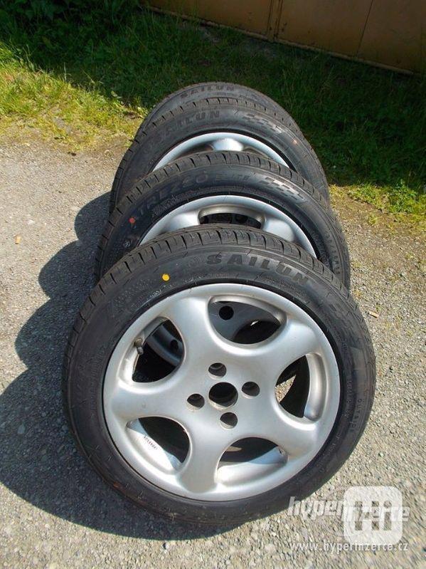 Letní pneu-nové na diskách - foto 1