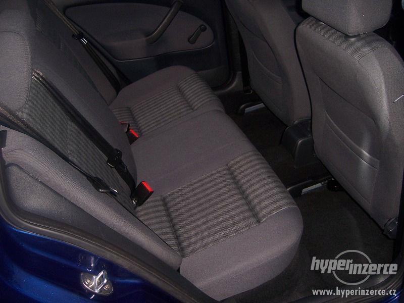 Škoda Octavia 1,9 TDi Tour - foto 13