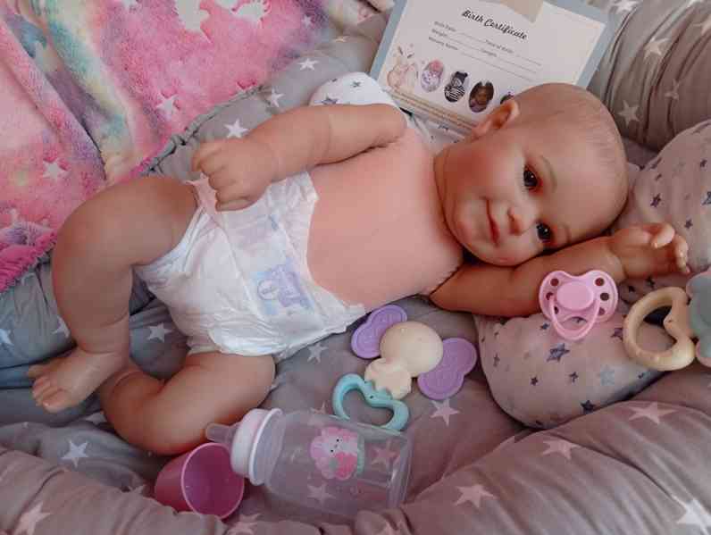 Realistická Reborn panenka usměvavá holčička Maddie  - foto 10