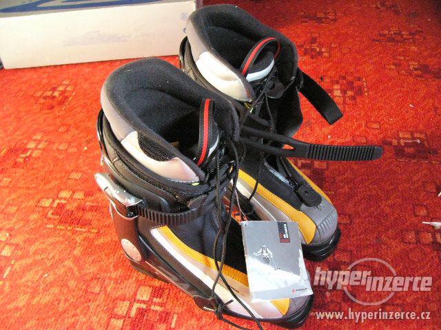 lyžáky,lyžařské boty - foto 1