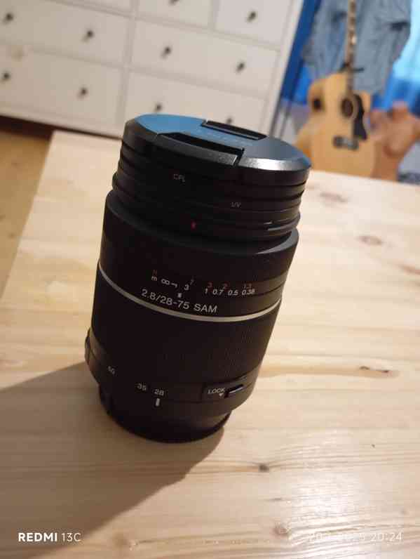 Prodám velmi dobrý objektiv Sony 2,8/28-75 SAM - foto 2