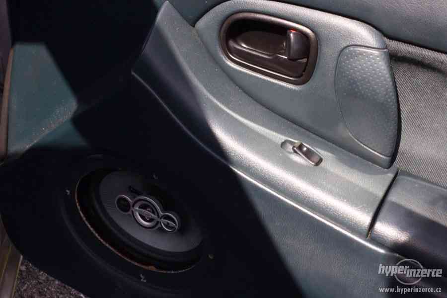 Mazda 323 F 1.5I - foto 14