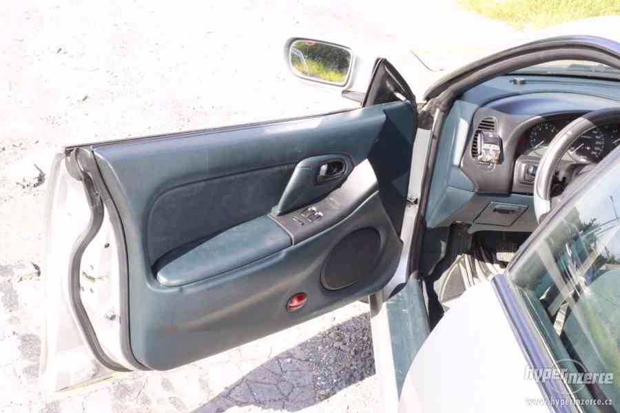 Mazda 323 F 1.5I - foto 19