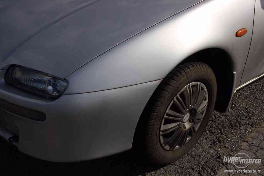 Mazda 323 F 1.5I - foto 20