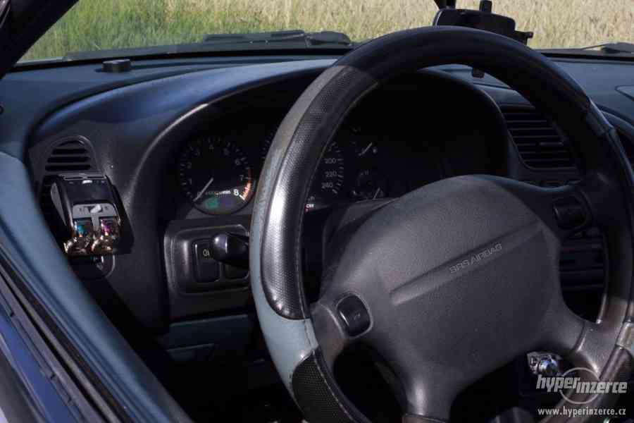 Mazda 323 F 1.5I - foto 21