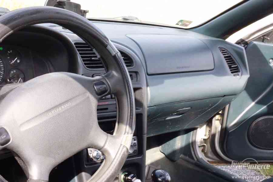 Mazda 323 F 1.5I - foto 22