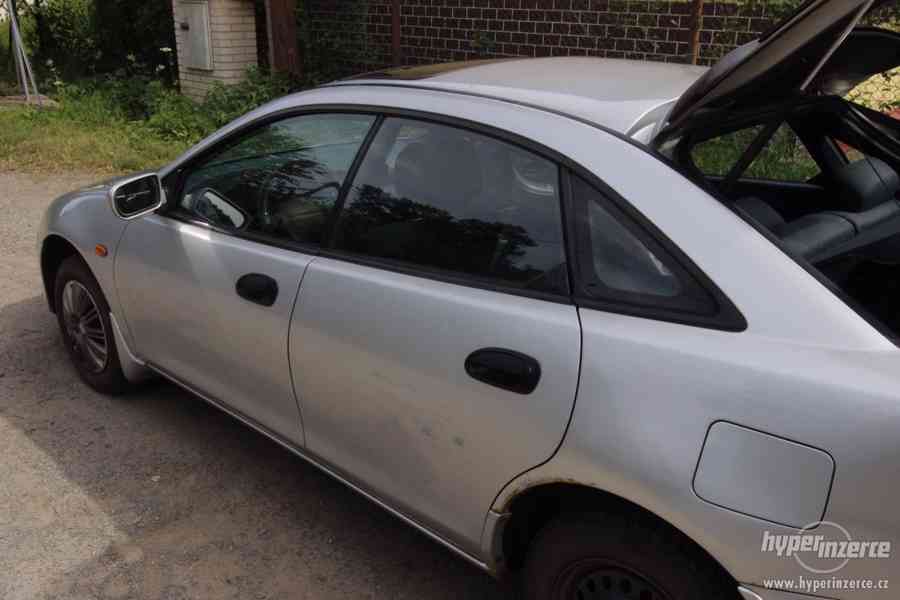 Mazda 323 F 1.5I - foto 28