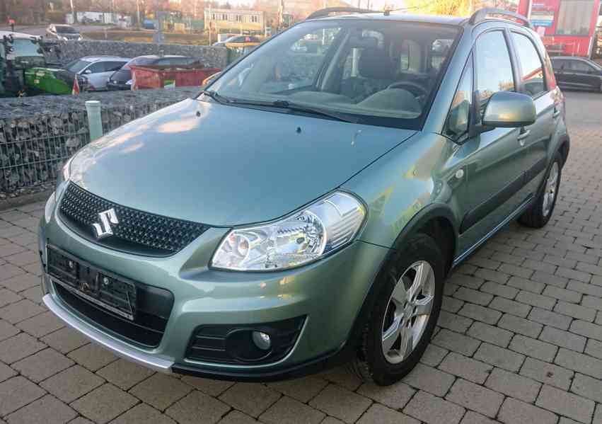 Suzuki SX4 1,6i 4x4 benzín 88kw - foto 11