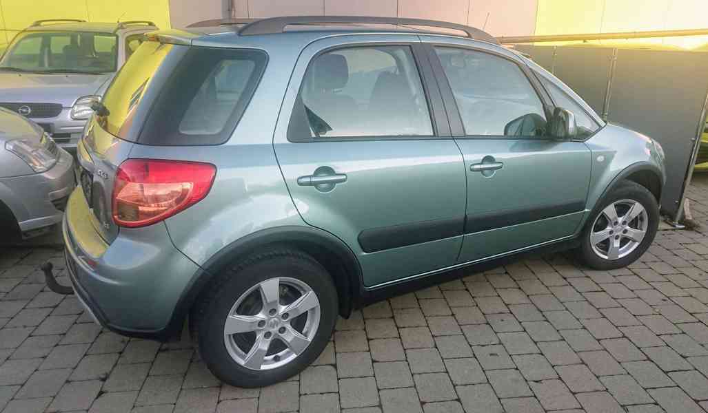 Suzuki SX4 1,6i 4x4 benzín 88kw - foto 7