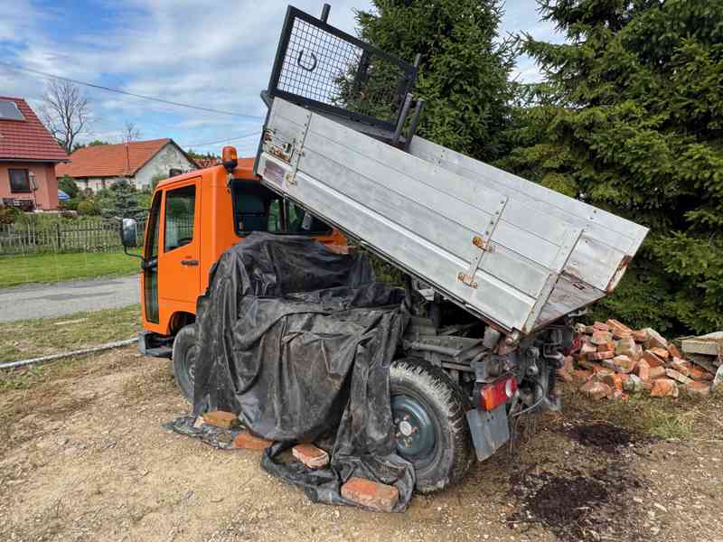 UX 100, Unimog - foto 11