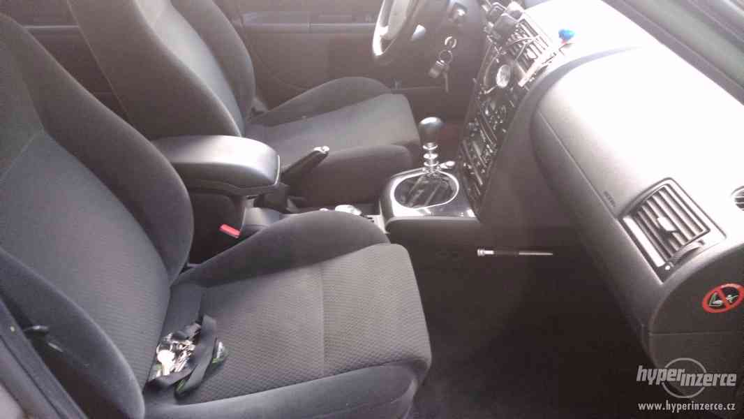 Mondeo MK3 2.0 TDCi 96Kw - foto 11