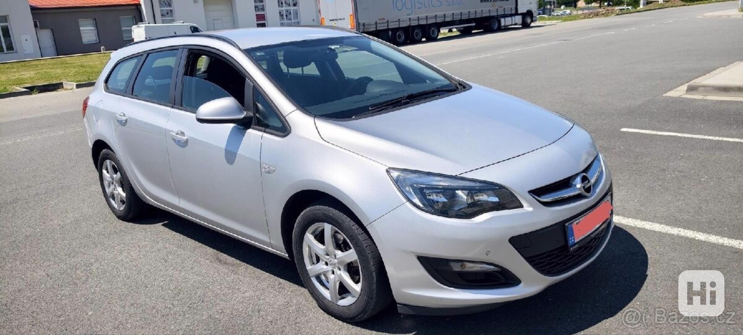Opel Astra 1,4   sport tourer - foto 1