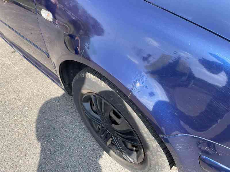 Volkswagen Golf 1. 9 TDI - foto 11
