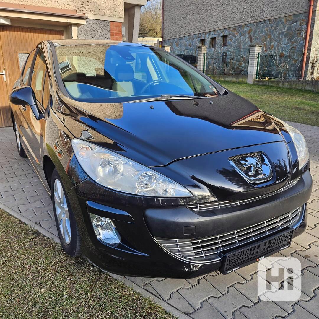 Peugeot 308 - foto 1