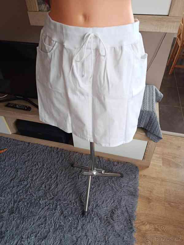 Bílá sukně s kapsami sesterská velikost 44 - foto 2