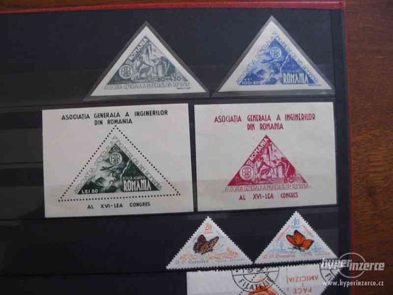 Sbírka trojúhelníkových známek. - foto 14