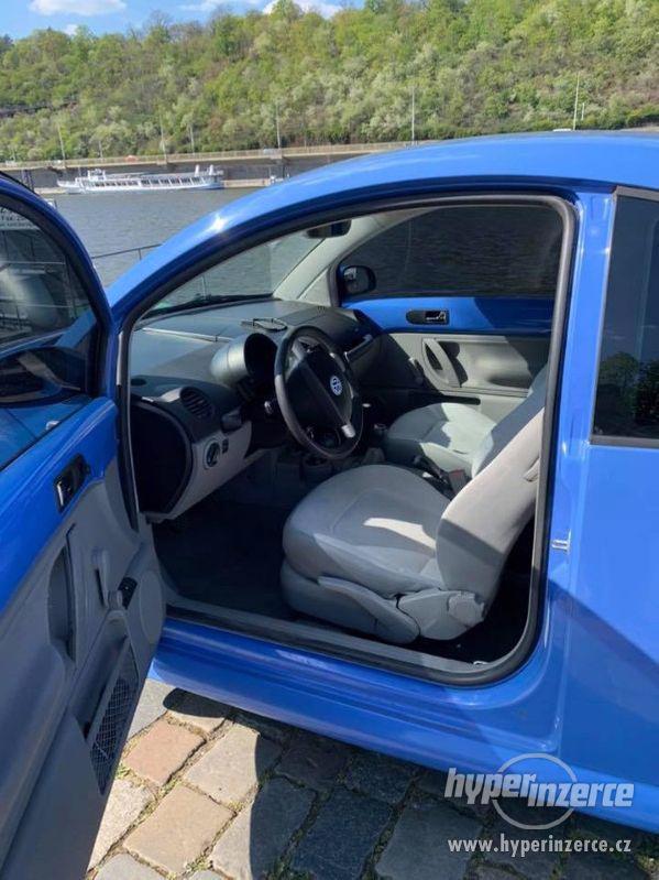 Volkswagen New Beetle - foto 4