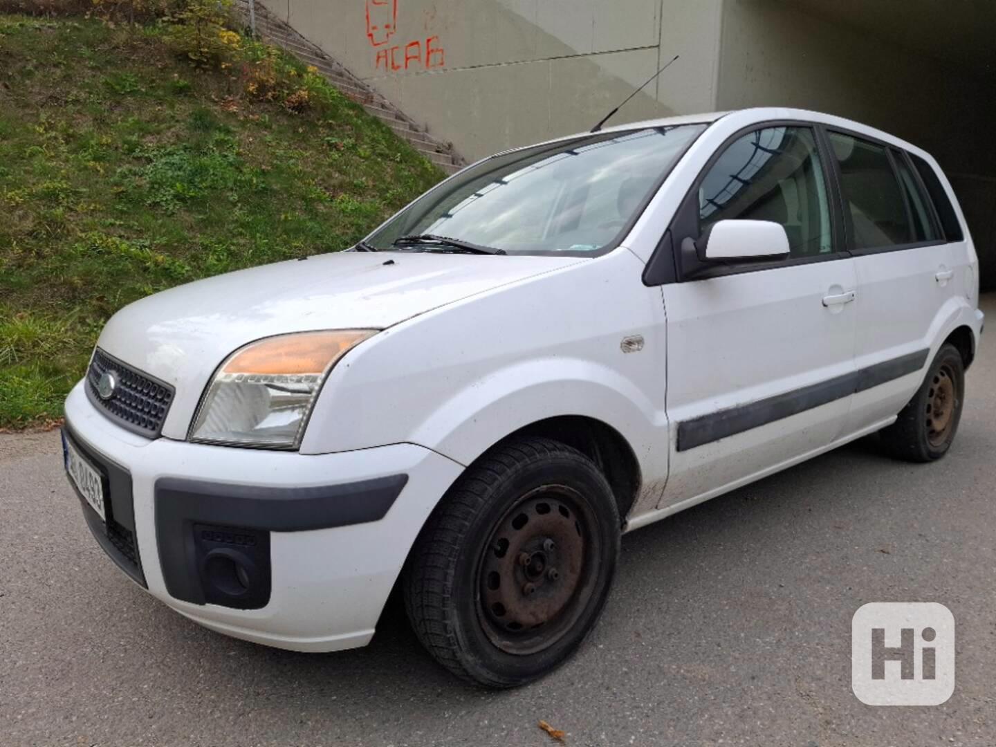 Fusion1.4i SPOELHLIVÝ VŮZ / DENNÍ PROVOZ, ZIMNÍ PNEU, CLIMA - foto 1