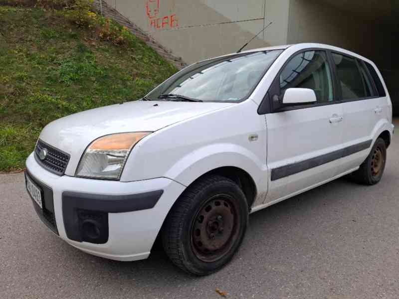 Fusion1.4i SPOELHLIVÝ VŮZ / DENNÍ PROVOZ, ZIMNÍ PNEU, CLIMA - foto 1