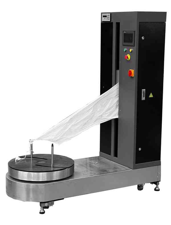 Stroj na balení balíků a kufrů - foto 4