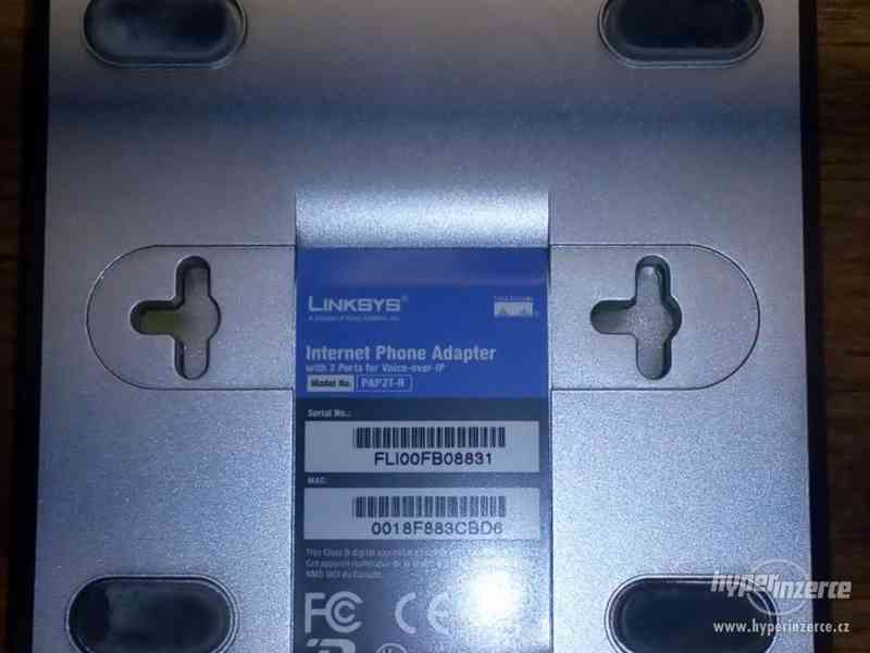 Prodám analogový telefonní adaptér Linksys PAP2T-R - foto 5