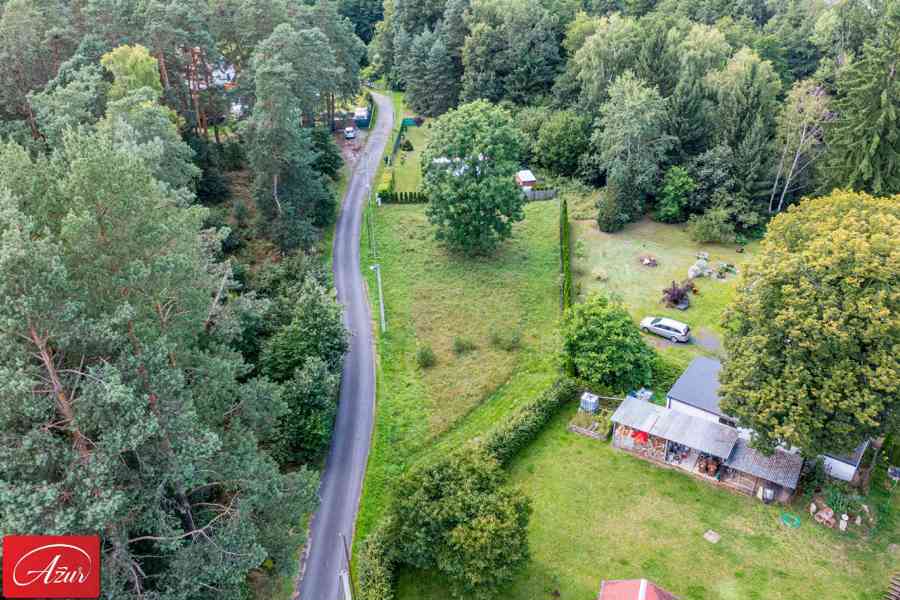 Rovinatý pozemek v krásné, zelené lokalitě - Ploužnice p. R. - foto 2