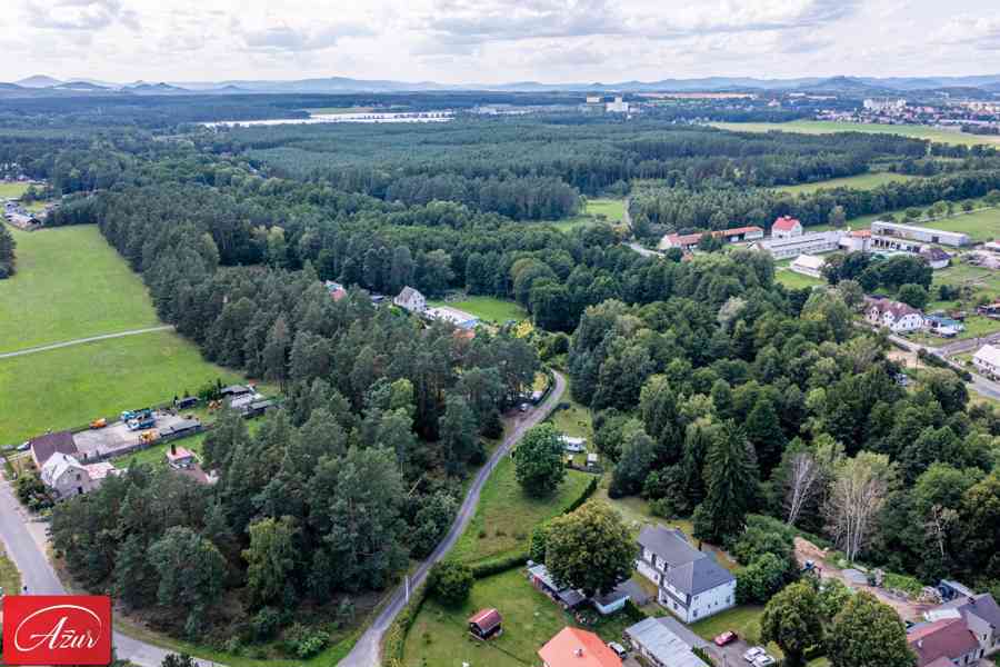 Rovinatý pozemek v krásné, zelené lokalitě - Ploužnice p. R. - foto 16