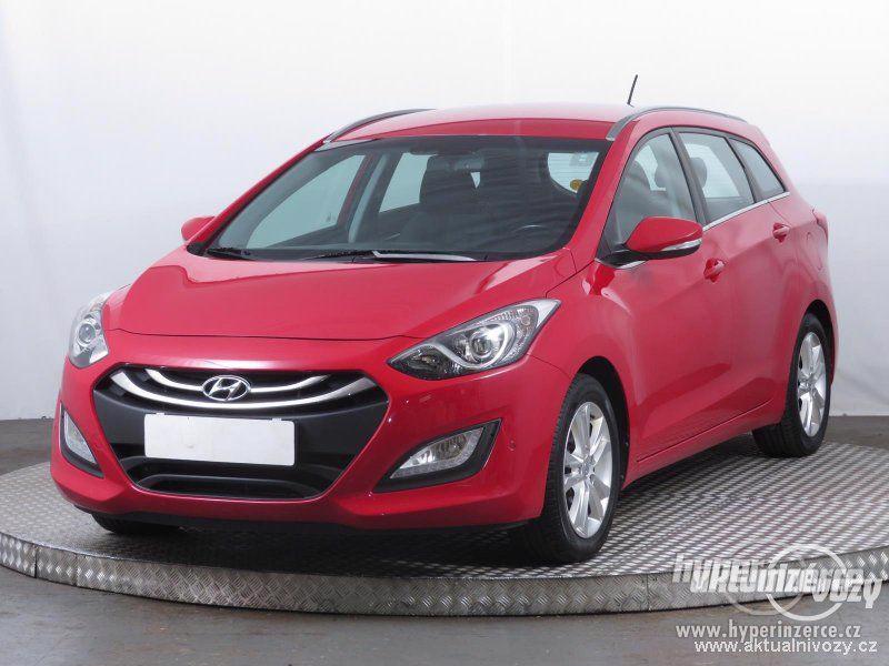 Hyundai i30 1.6, benzín, r.v. 2014 - foto 16