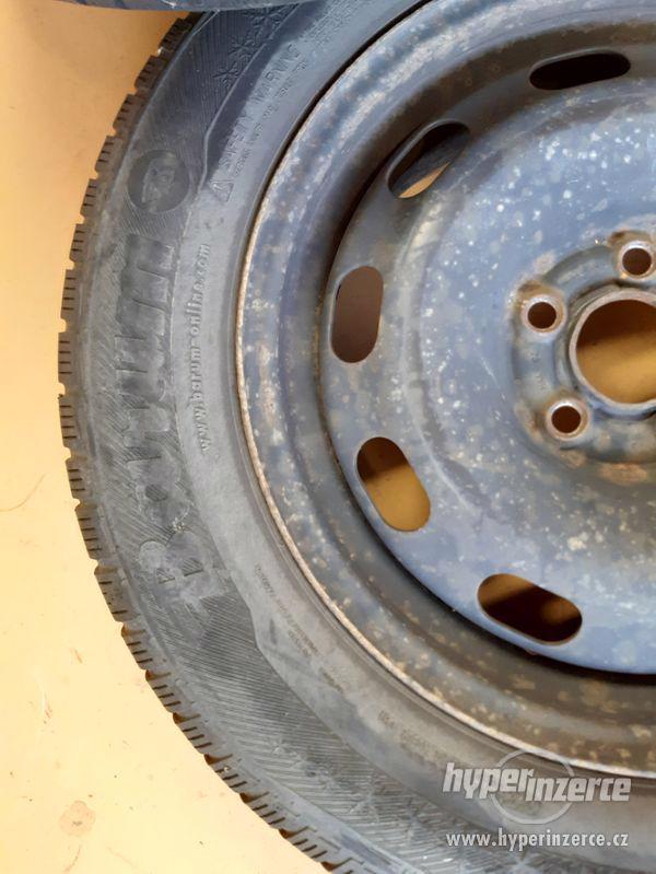 Zimní pneumatiky s plechovými disky - foto 3