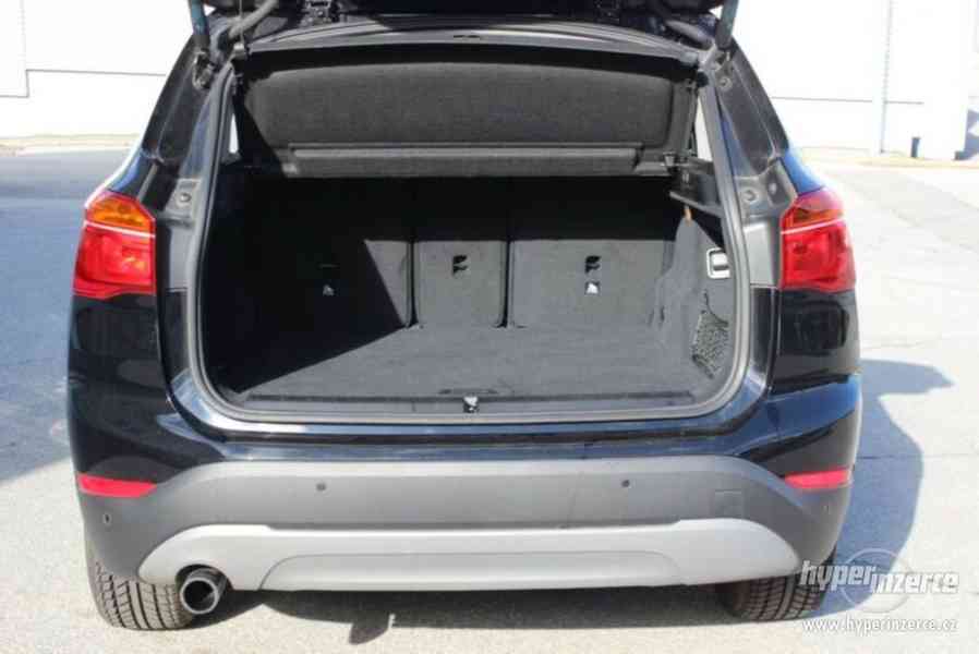 BMW X1 Plato kufru a rozkládací podlaha. - foto 1