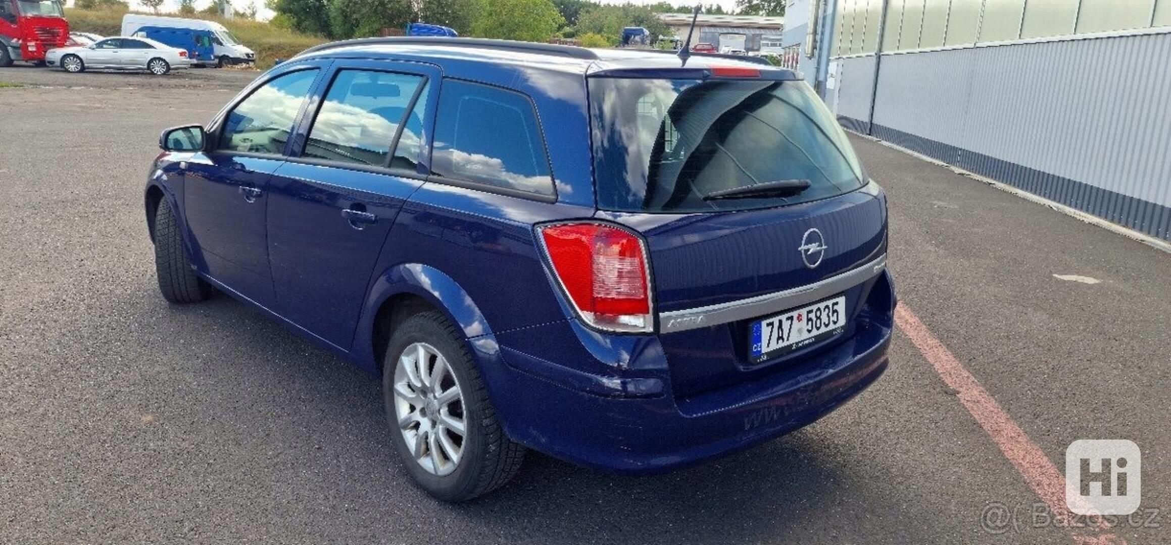 Opel Astra 1,6   i 16V - foto 1
