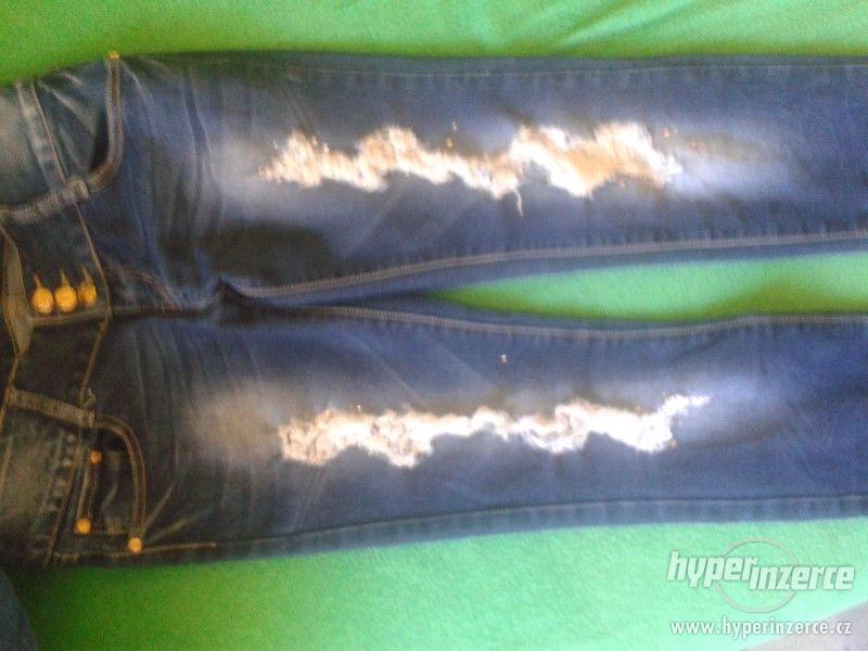 Dámské džíny - foto 1