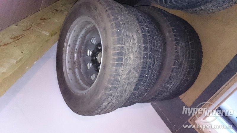 Zimní pneumatiky s disky na škoda Felicia 4X - foto 1