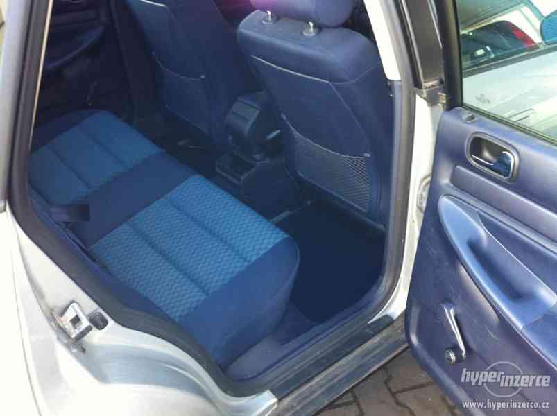 Audi A4 1.9 TDI quattro - foto 11