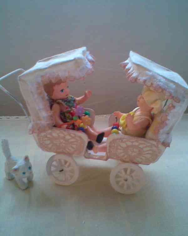 Kočárek s panenkami