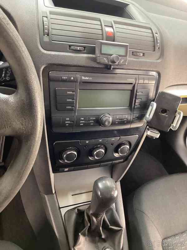 Škoda Octavia 1,6   Combi TDi 77 kw - foto 8